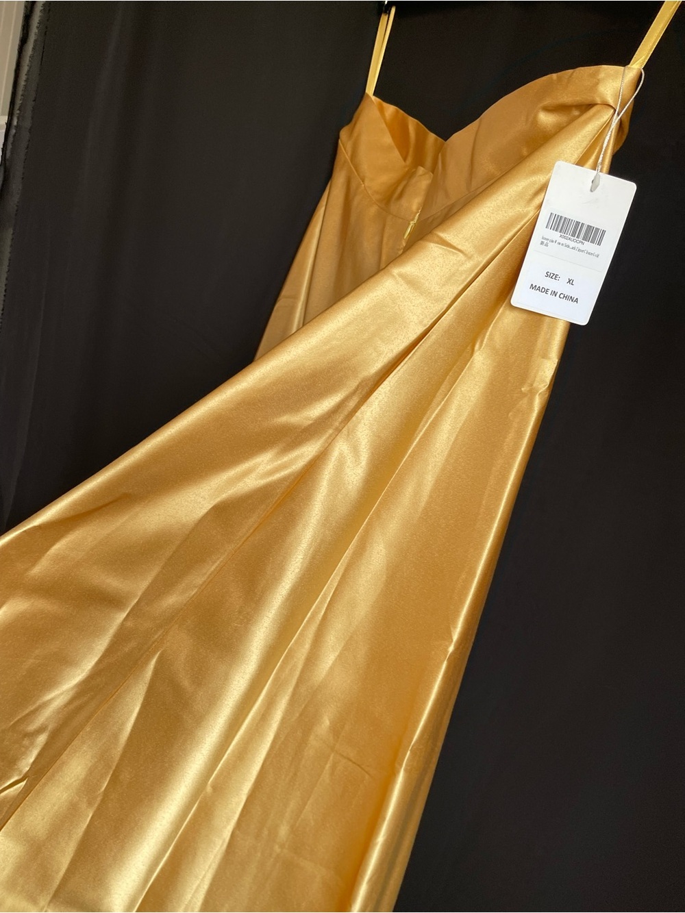 Long full gold satin skirt.